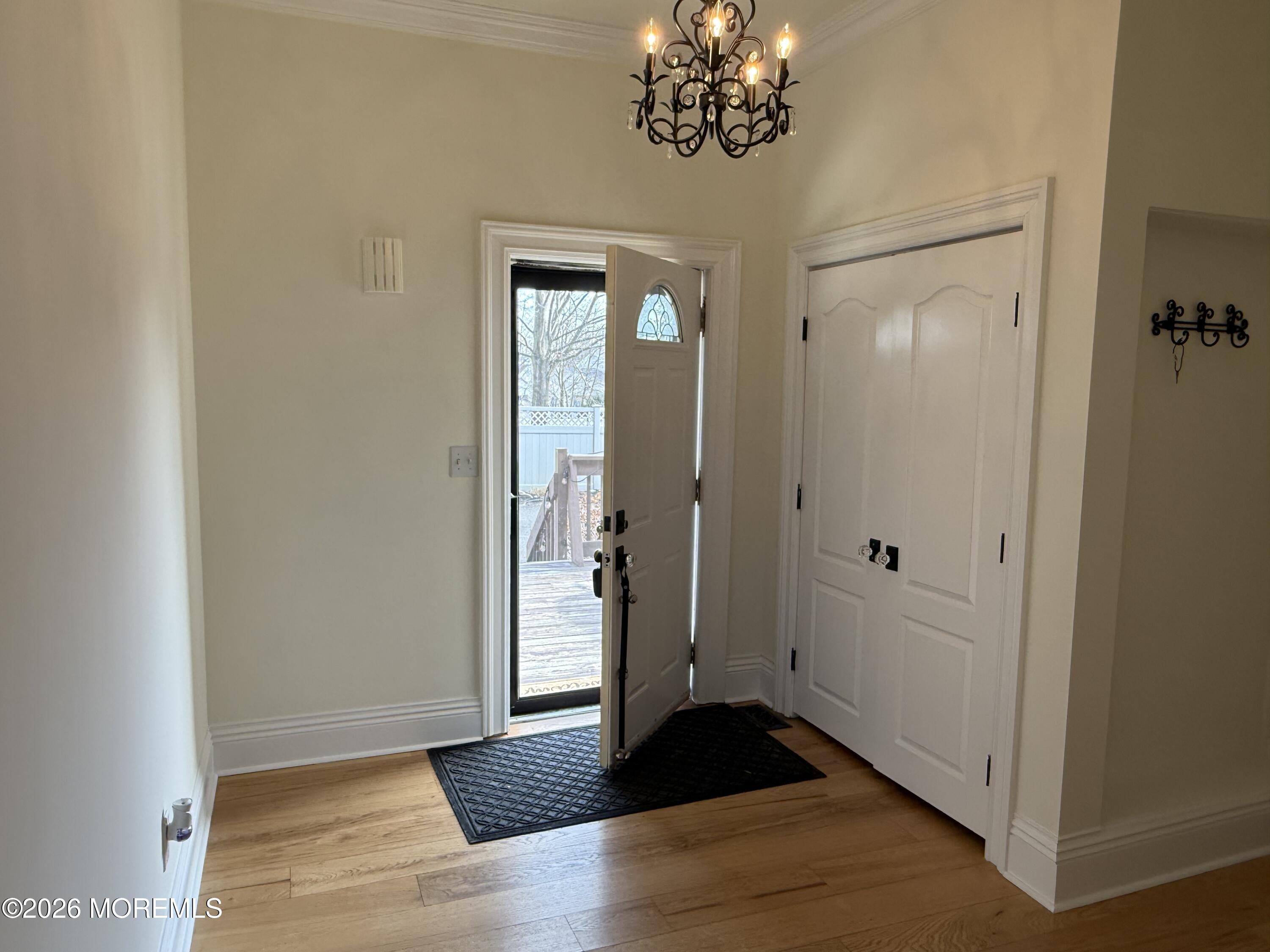 25 Monmouth Road, Unit 3 Oceanport, NJ 07757 - Photo 3 of 21 a view of an entryway with wooden floor