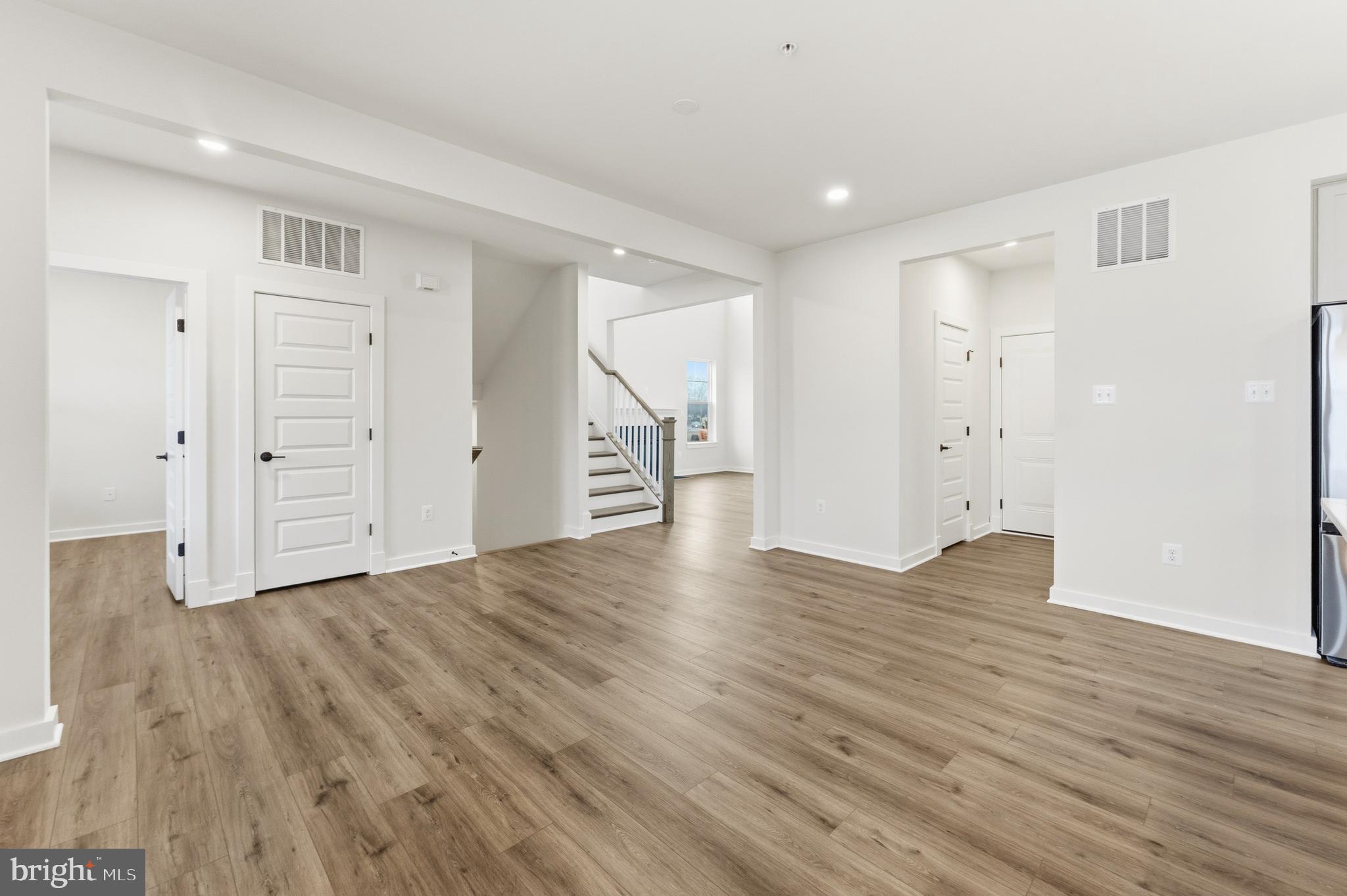 19110 Tatie Way Poolesville, MD 20837 - Photo 9 of 29 wooden floor with white walls