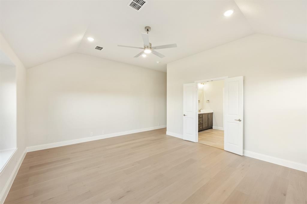 1024 Silver Sage Drive Justin, TX 76247 - Photo 24 of 35 an empty room with fan and entrance