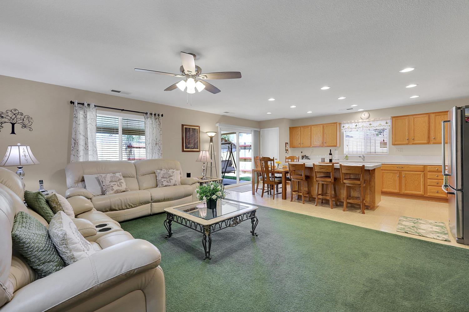 9840 Ellis Way Live Oak, CA 95953 - Photo 17 of 44 a living room with furniture and kitchen view