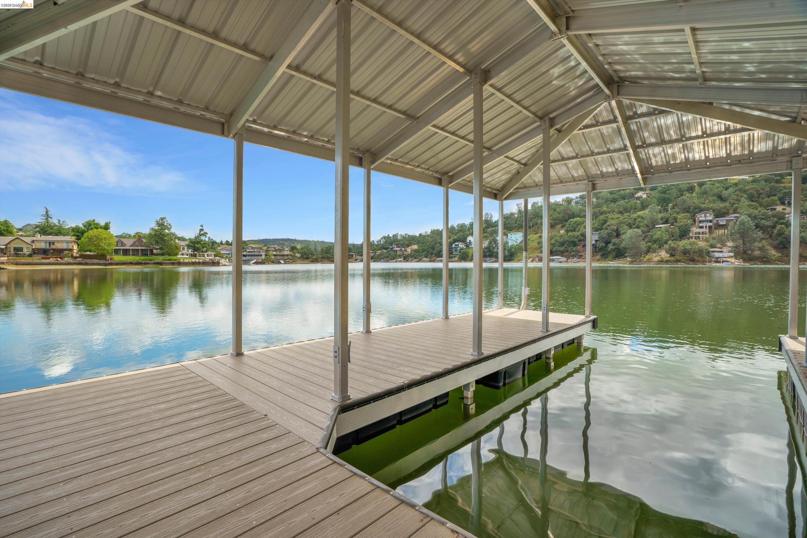 4459 Council Trail Copperopolis, CA 95228 - Photo 1 of 16 a view of a lake with sitting area