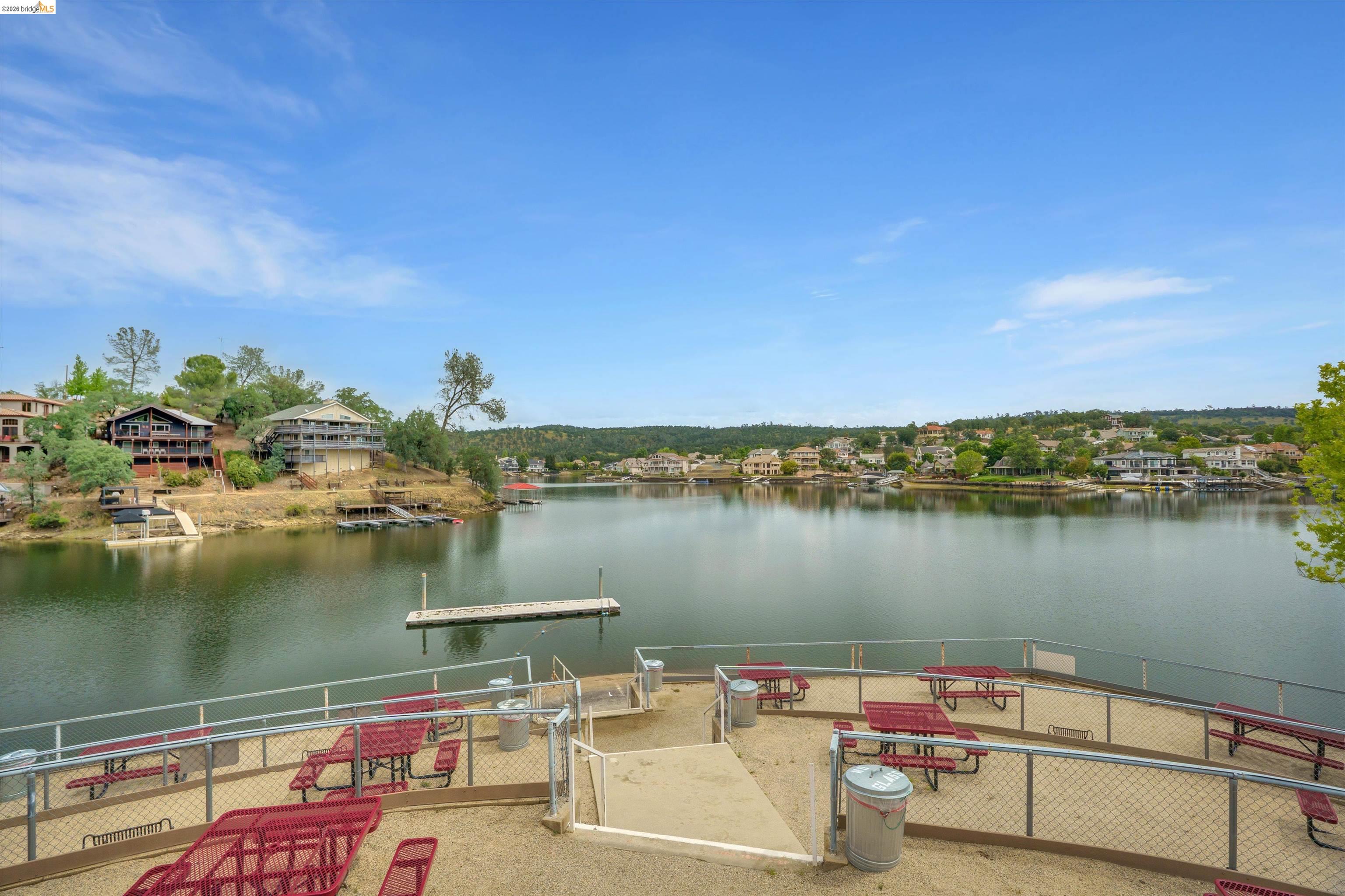 4459 Council Trail Copperopolis, CA 95228 - Photo 16 of 16 a view of a lake with couches chairs