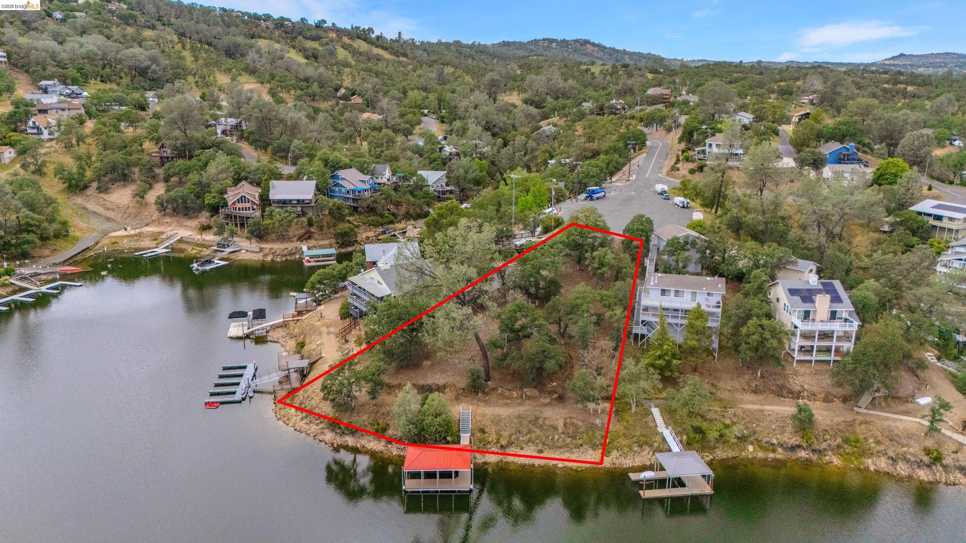 4459 Council Trail Copperopolis, CA 95228 - Photo 3 of 16 an aerial view of residential houses with outdoor space and lake view