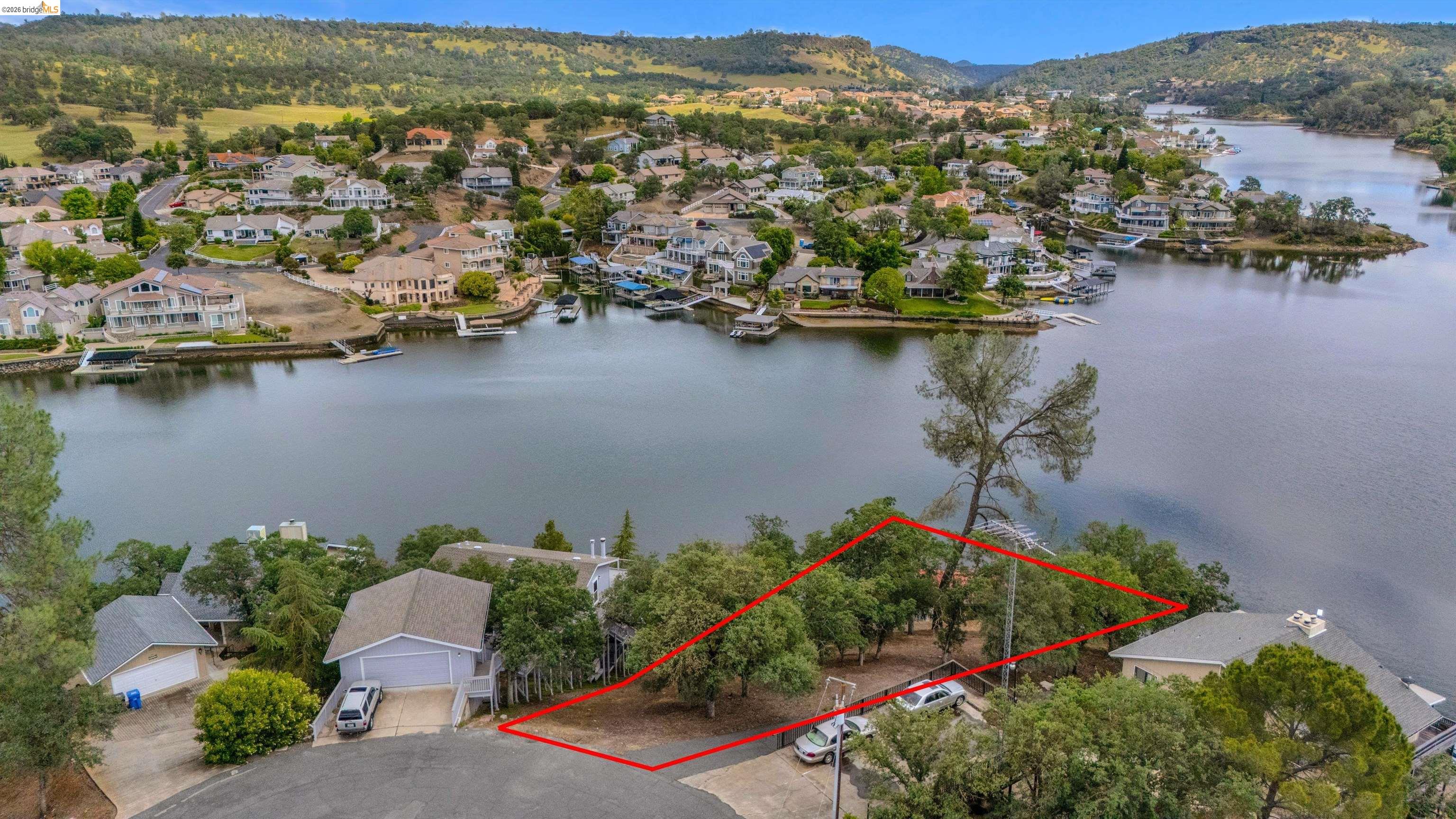 4459 Council Trail Copperopolis, CA 95228 - Photo 9 of 16 an aerial view of a house with a lake view
