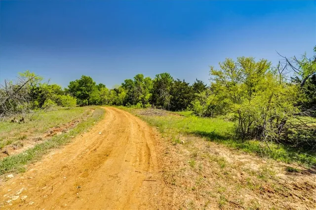 a view of a swimming pool and an outdoor space
