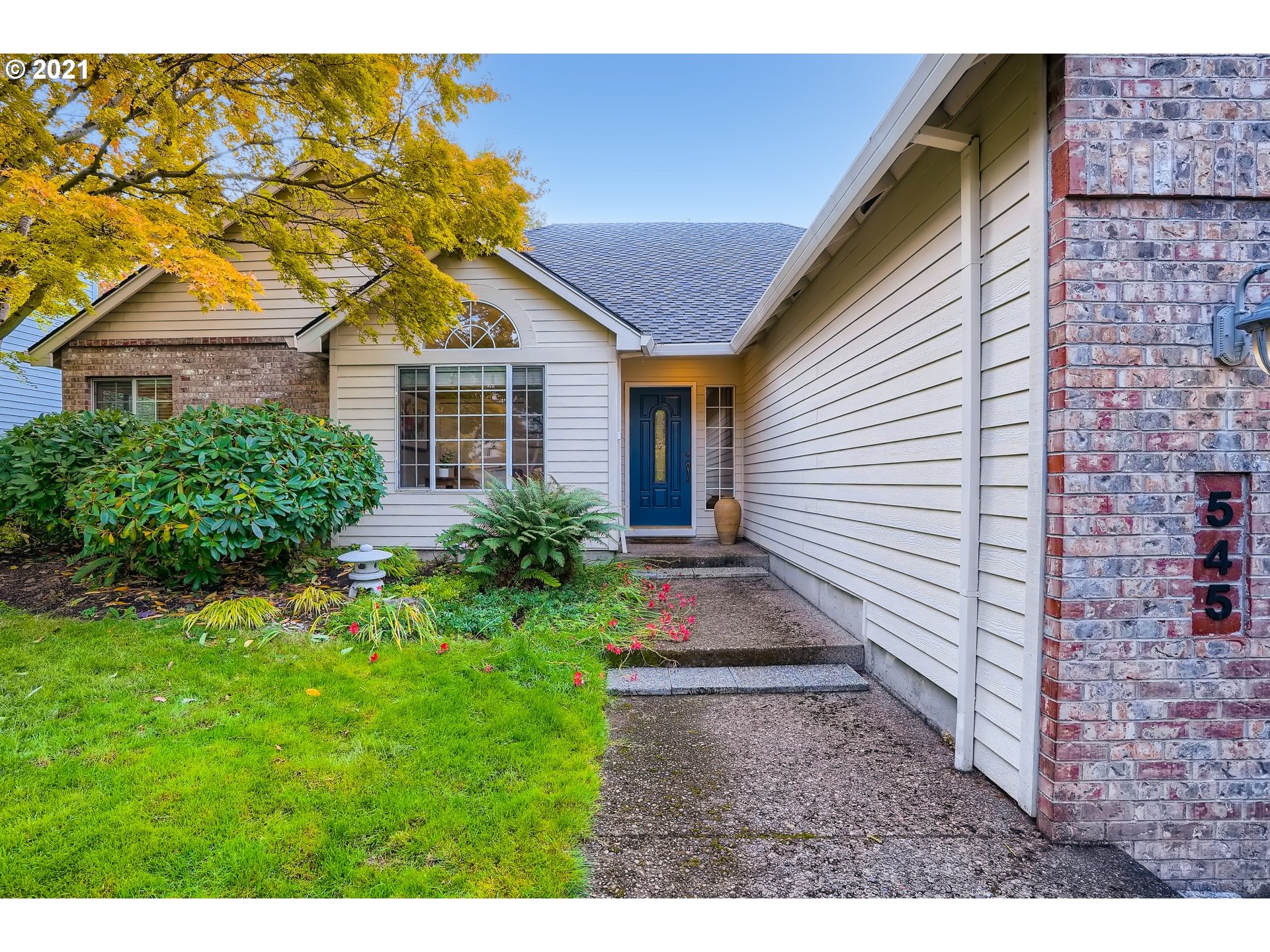 545 Southwest 167th Avenue Beaverton, OR 97006 - Photo 2 of 32 a view of house with a yard and potted plants