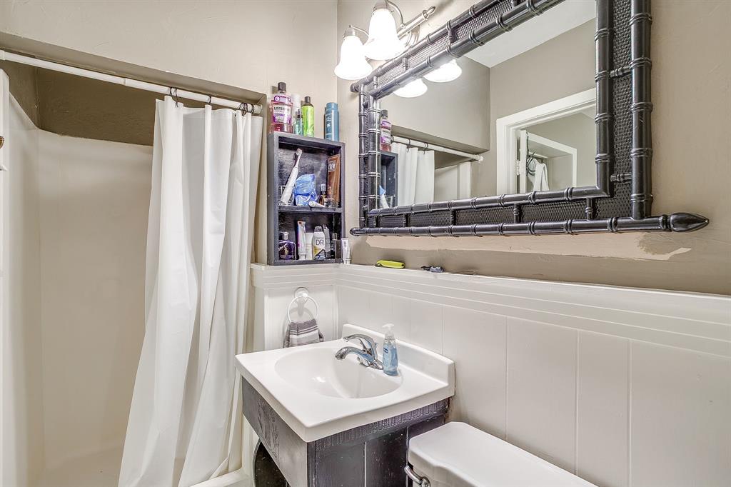 3612 Winston Road Fort Worth, TX 76109 - Photo 27 of 40 a bathroom with a sink and a mirror