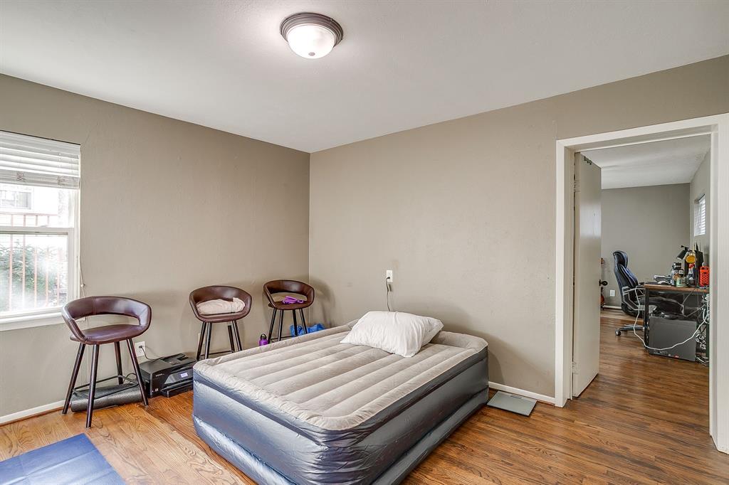 3612 Winston Road Fort Worth, TX 76109 - Photo 28 of 40 a bedroom with furniture and a wooden floor