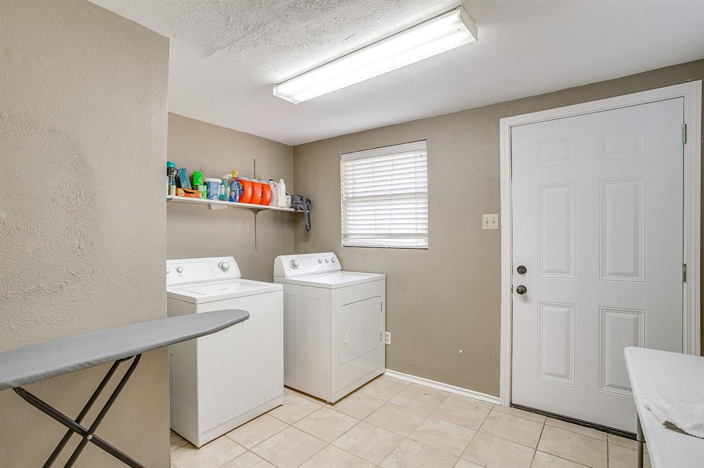 3612 Winston Road Fort Worth, TX 76109 - Photo 33 of 40 a view of utility room with washer and dryer