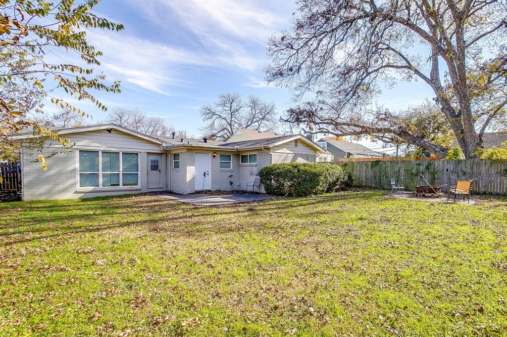 3612 Winston Road Fort Worth, TX 76109 - Photo 35 of 40 a view of a house with a yard and a large tree