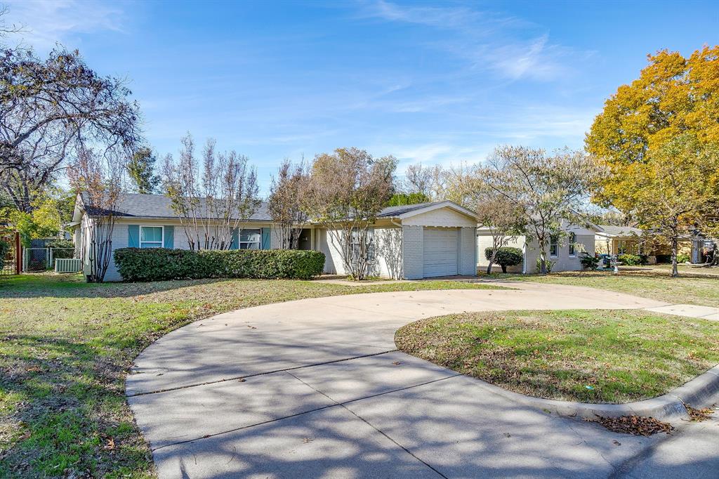 3612 Winston Road Fort Worth, TX 76109 - Photo 5 of 40 a front view of house with yard space and trees around