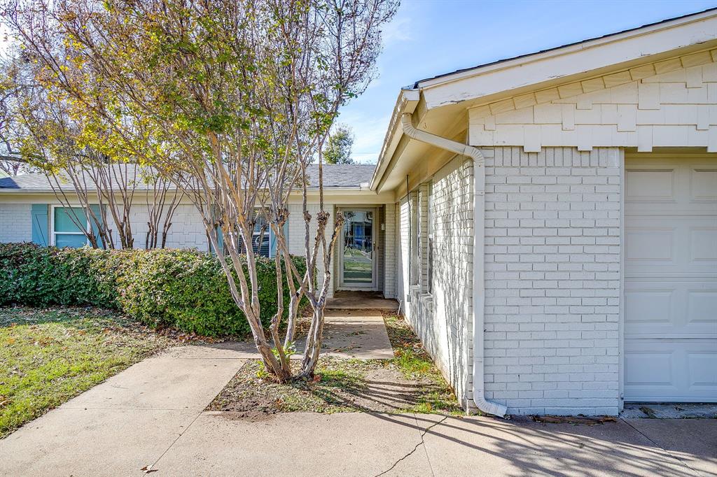 3612 Winston Road Fort Worth, TX 76109 - Photo 6 of 40 a front view of a house with garden