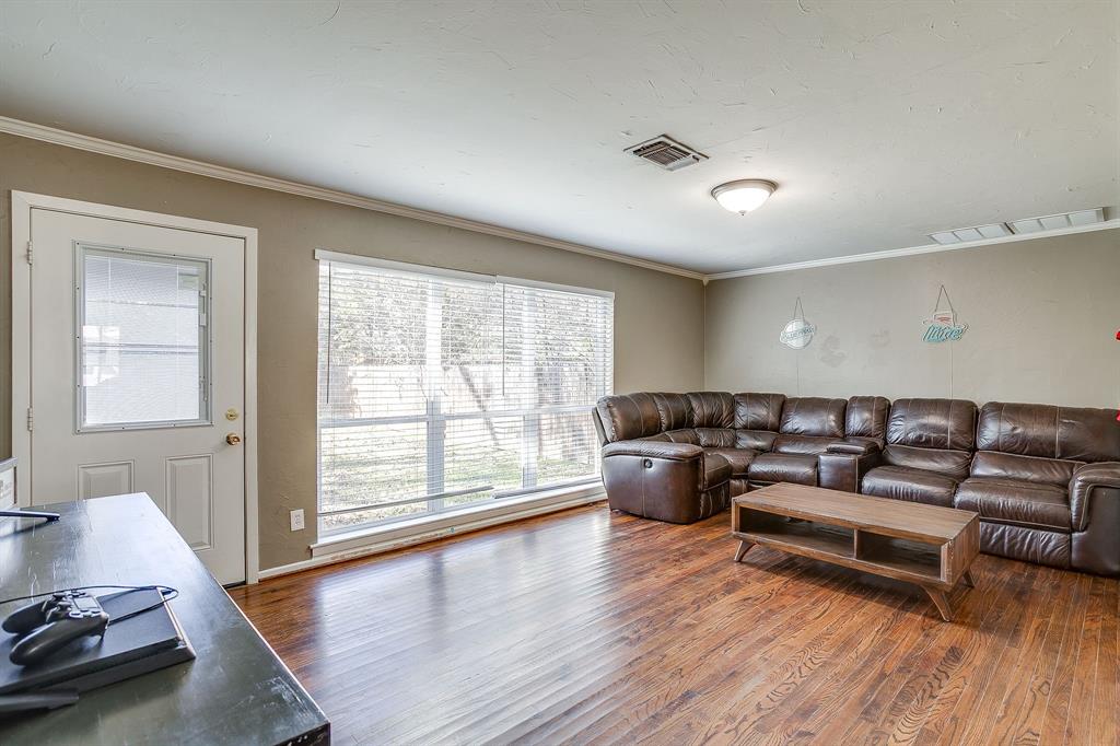 3612 Winston Road Fort Worth, TX 76109 - Photo 8 of 40 a living room with furniture and wooden floor