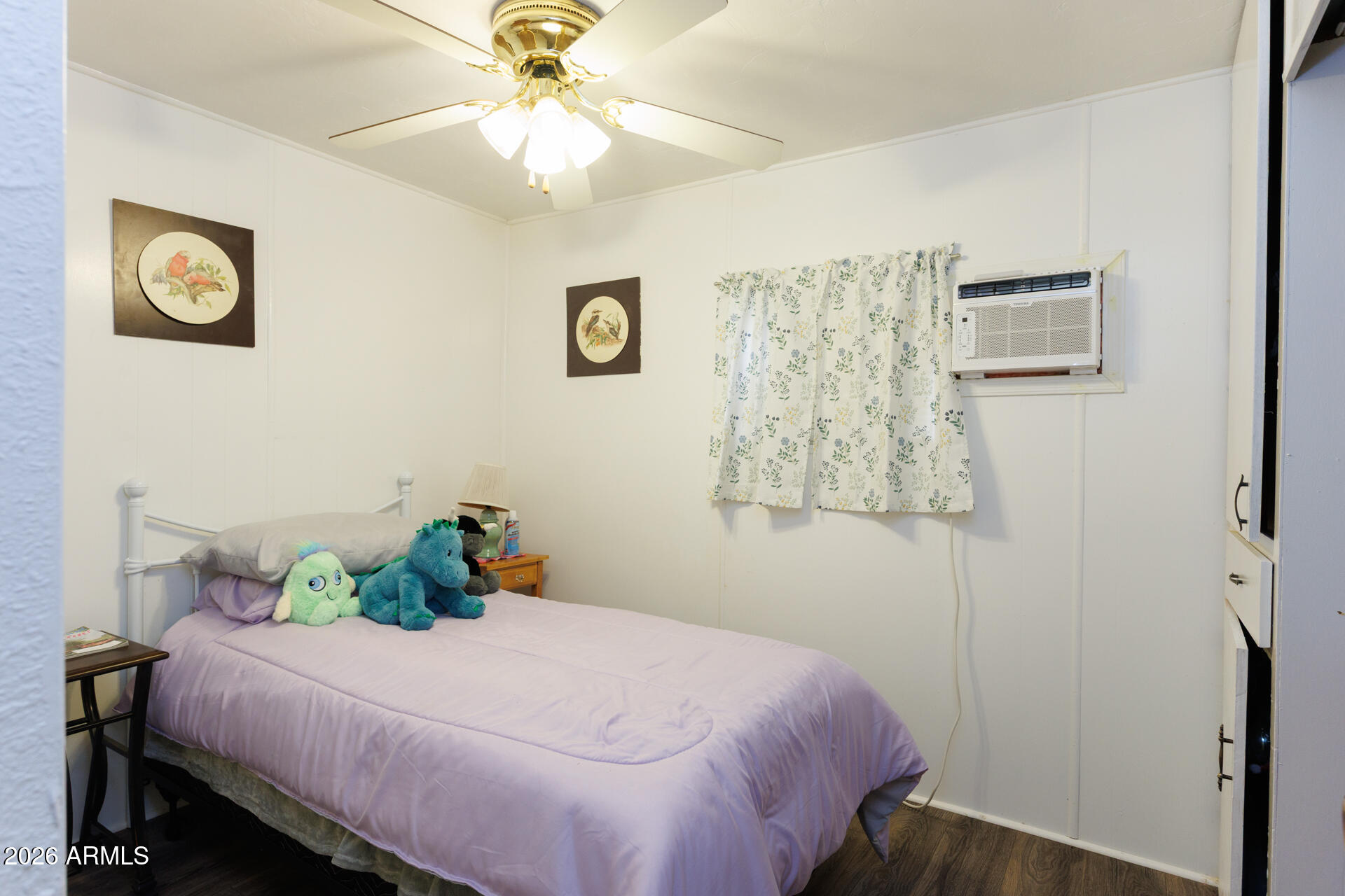 6185 East Monitor Street Picacho, AZ 85141 - Photo 34 of 55 a bedroom with a bed and a table