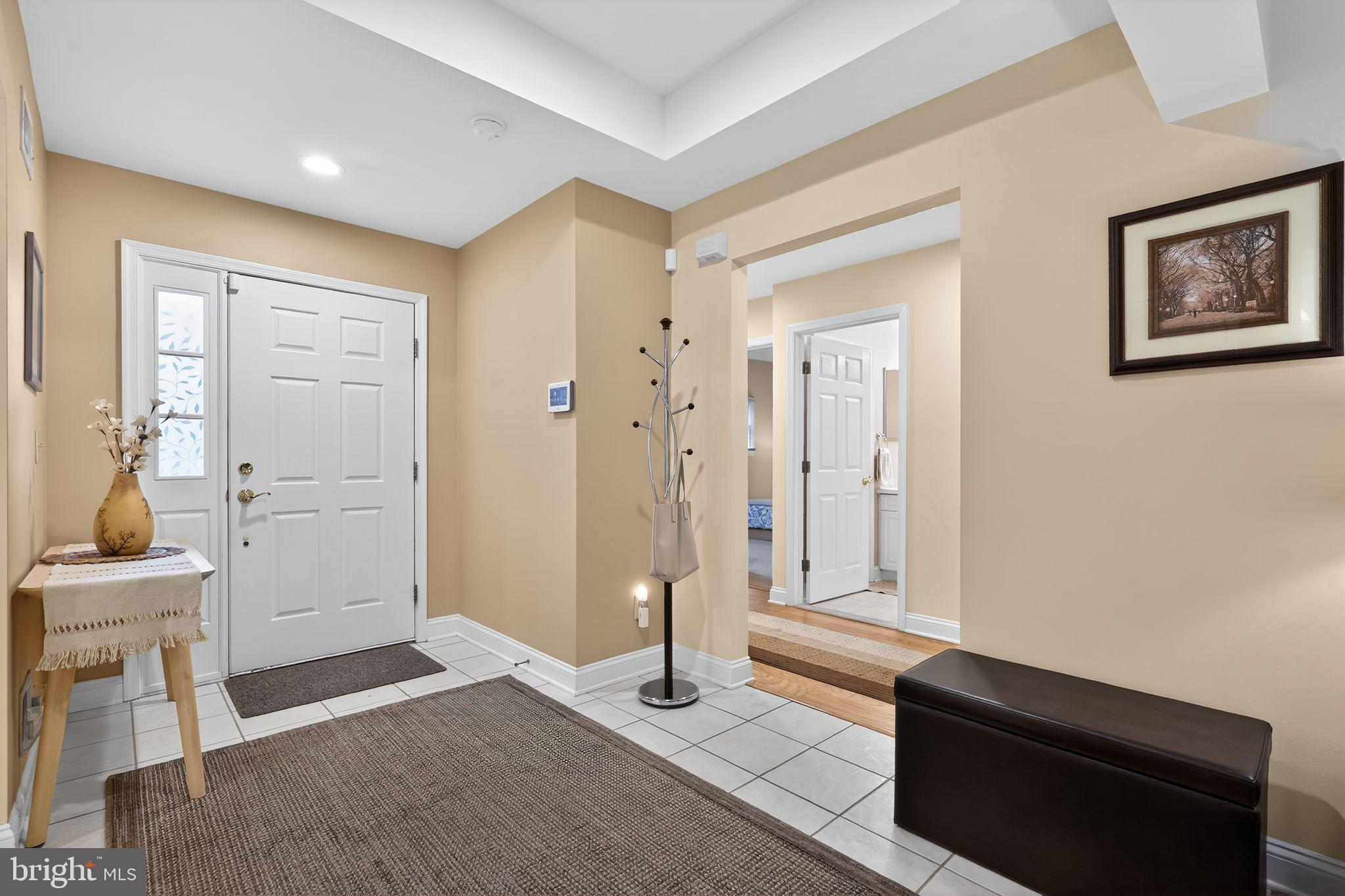 13 Hedge Row Road Princeton, NJ 08540 - Photo 15 of 41 a view of a hallway with closet and cabinet