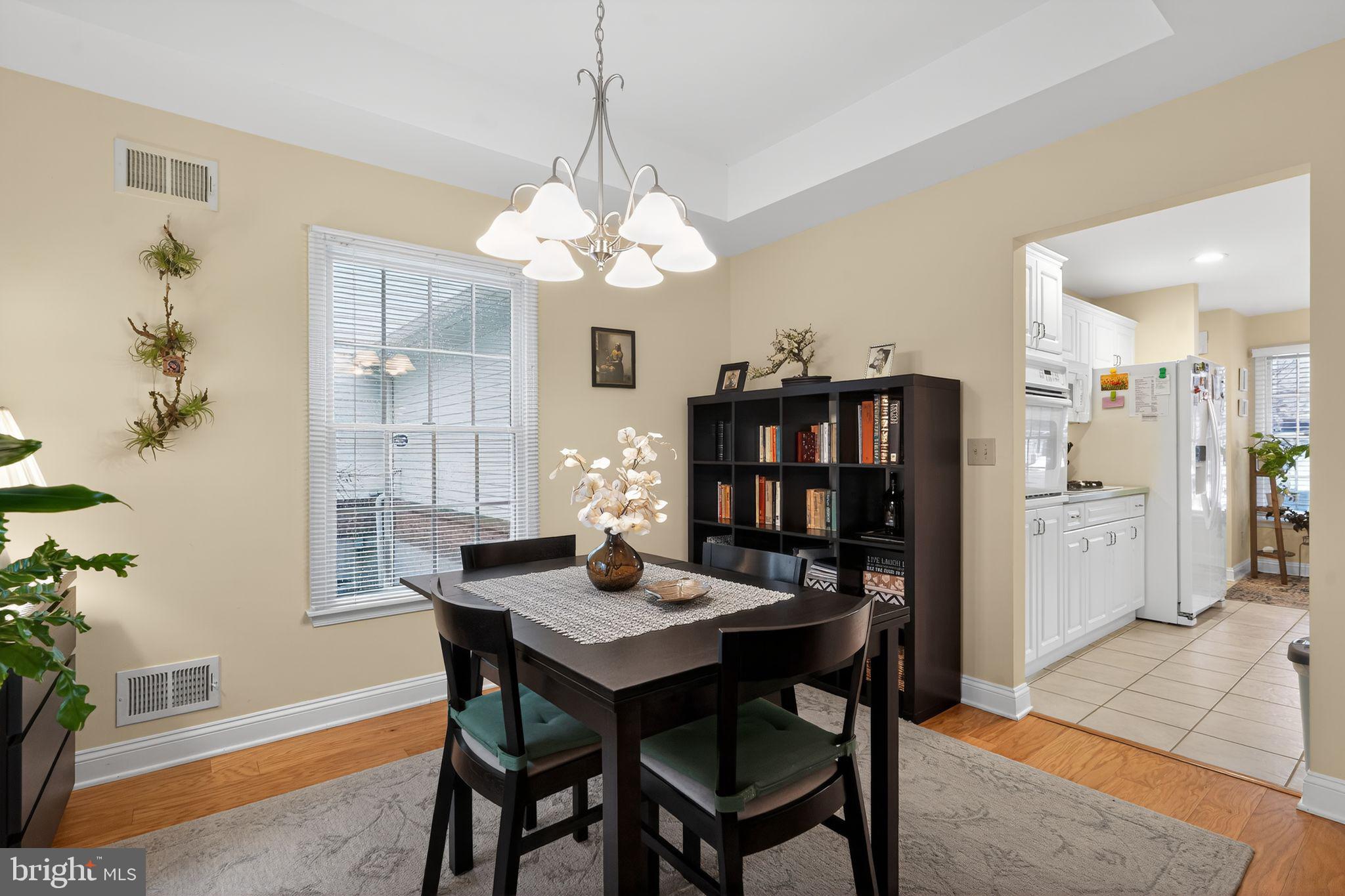 13 Hedge Row Road Princeton, NJ 08540 - Photo 25 of 41 a view of a dining room with furniture and chandelier
