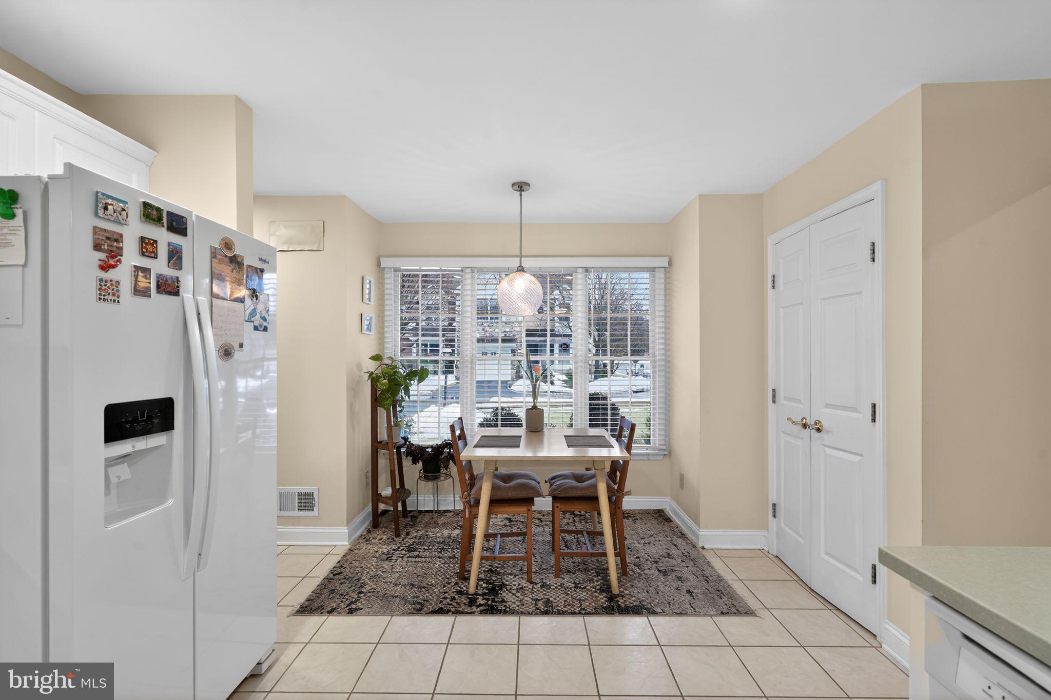 13 Hedge Row Road Princeton, NJ 08540 - Photo 27 of 41 a dining room with furniture and a window