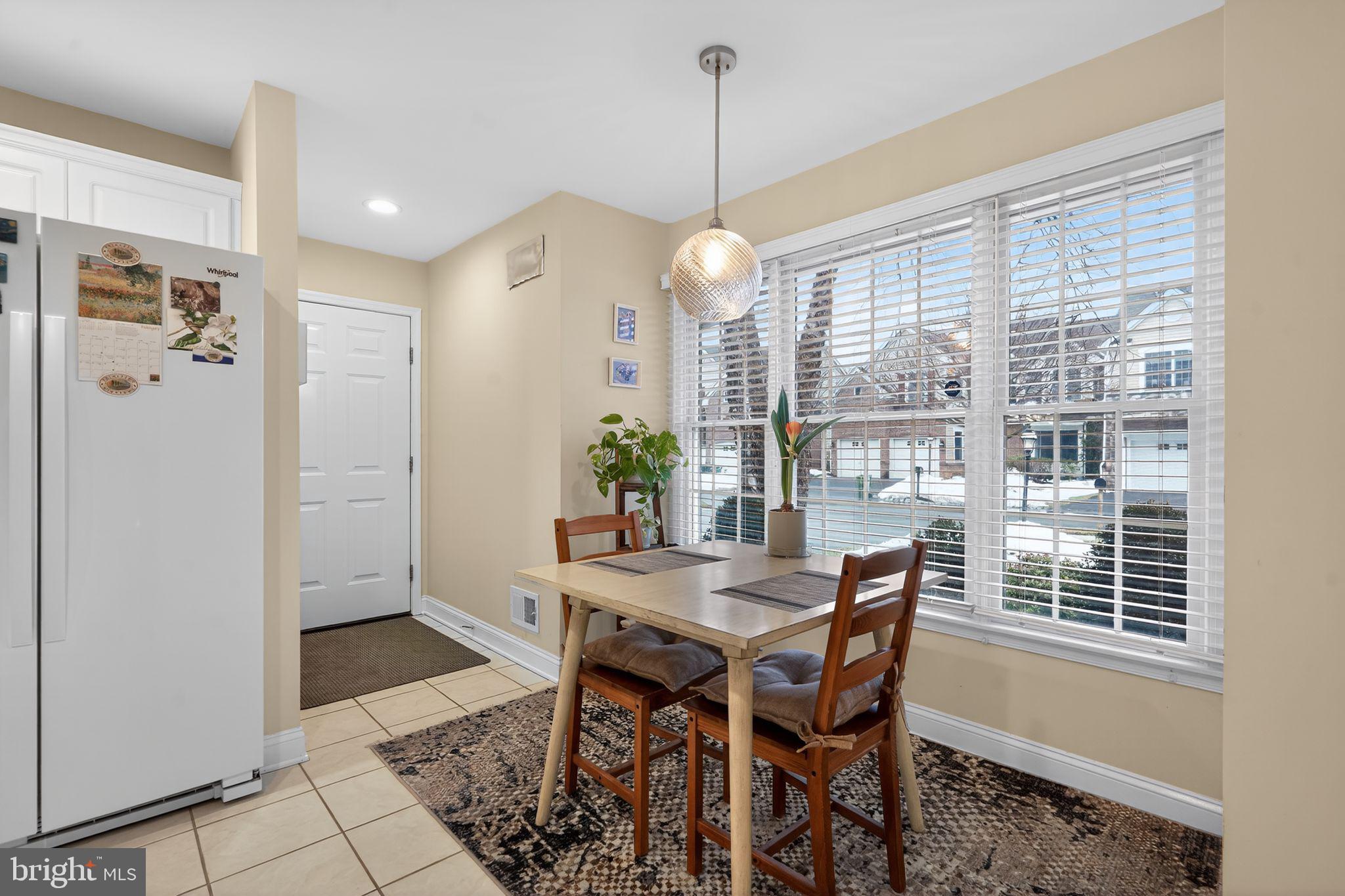 13 Hedge Row Road Princeton, NJ 08540 - Photo 28 of 41 a dining room with furniture a chandelier and window