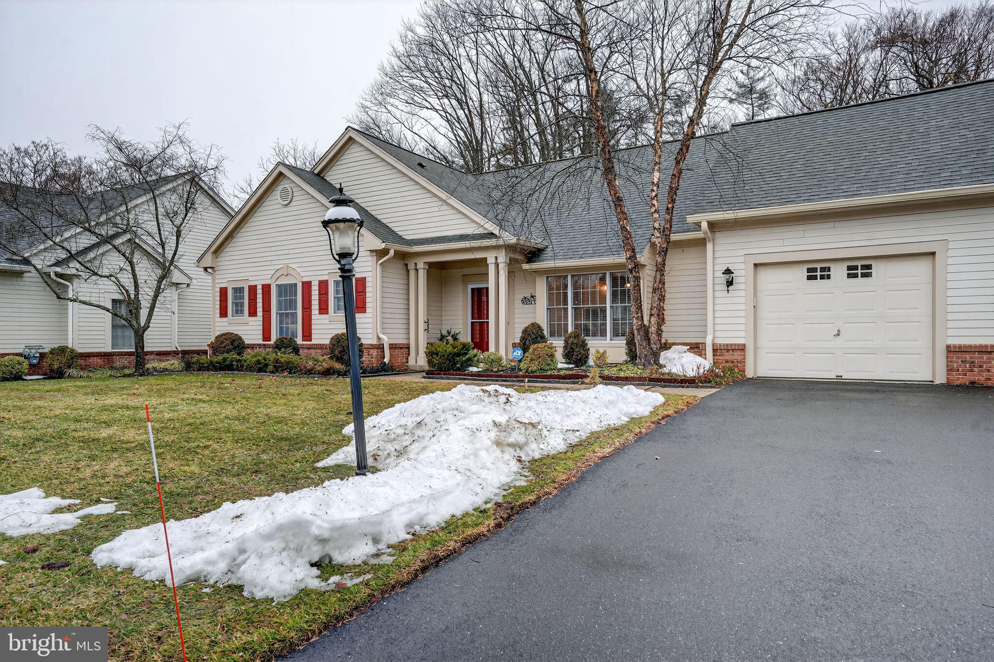 13 Hedge Row Road Princeton, NJ 08540 - Photo 3 of 41 a view of a white house with a big yard and a large tree