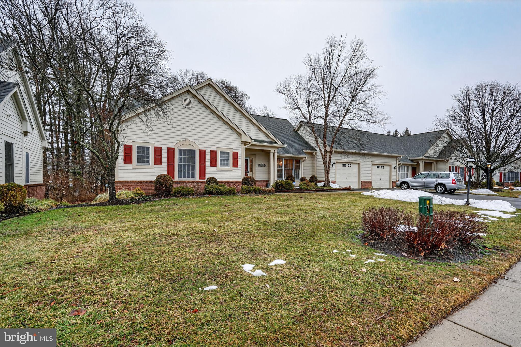 13 Hedge Row Road Princeton, NJ 08540 - Photo 4 of 41 a front view of a house with a yard garage and outdoor seating