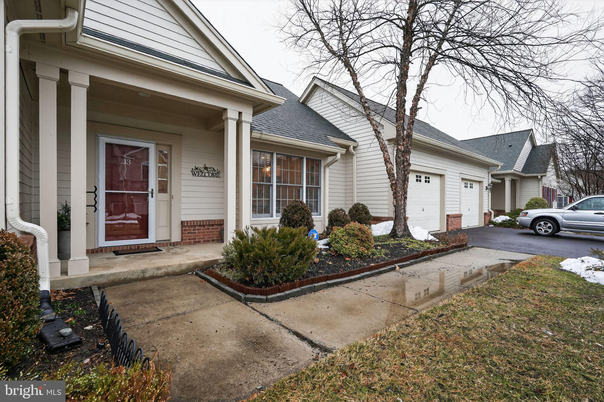 13 Hedge Row Road Princeton, NJ 08540 - Photo 10 of 41 a front view of a house with garden