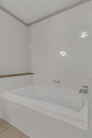 a bathroom with a bathtub