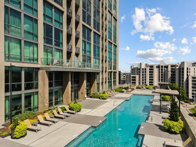 a view of swimming pool with patio