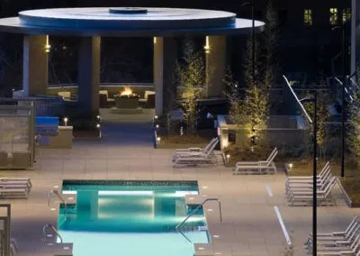 a view of swimming pool with outdoor seating