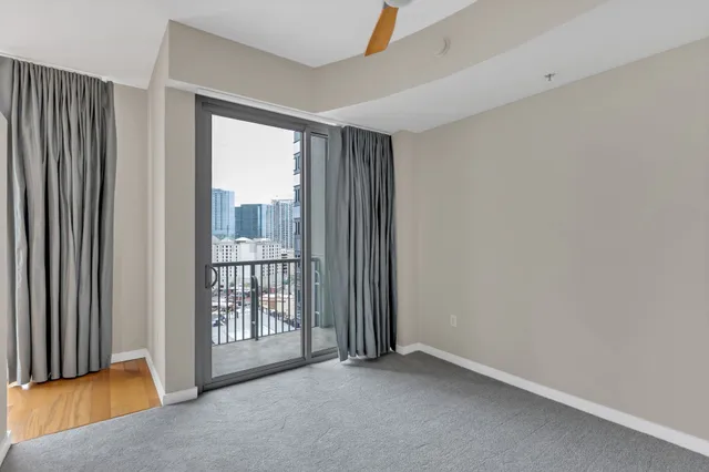 an empty room with windows