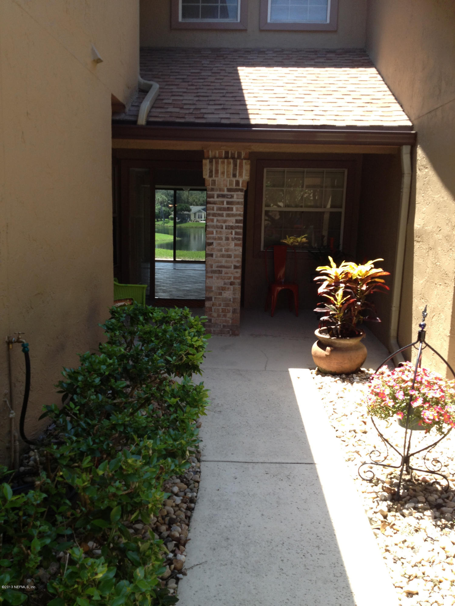 303 Tournament Road Ponte Vedra Beach, FL 32082 - Photo 3 of 33 Walkway to front porch