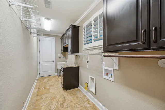 a view of kitchen with furniture and a window