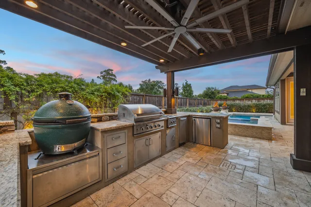 a kitchen with a stove and a sink