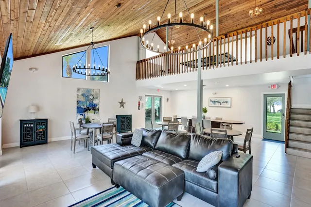 a view of a sign under a white building