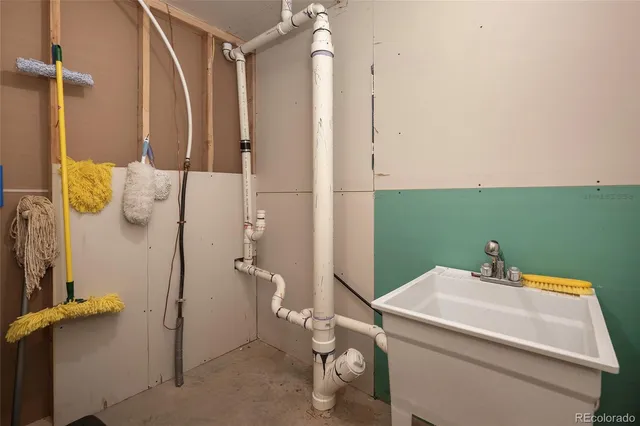 a view of a chairs and table in the patio