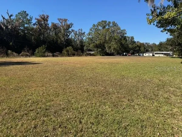 a view of outdoor space with yard