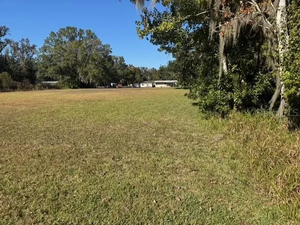 a view of outdoor space and yard