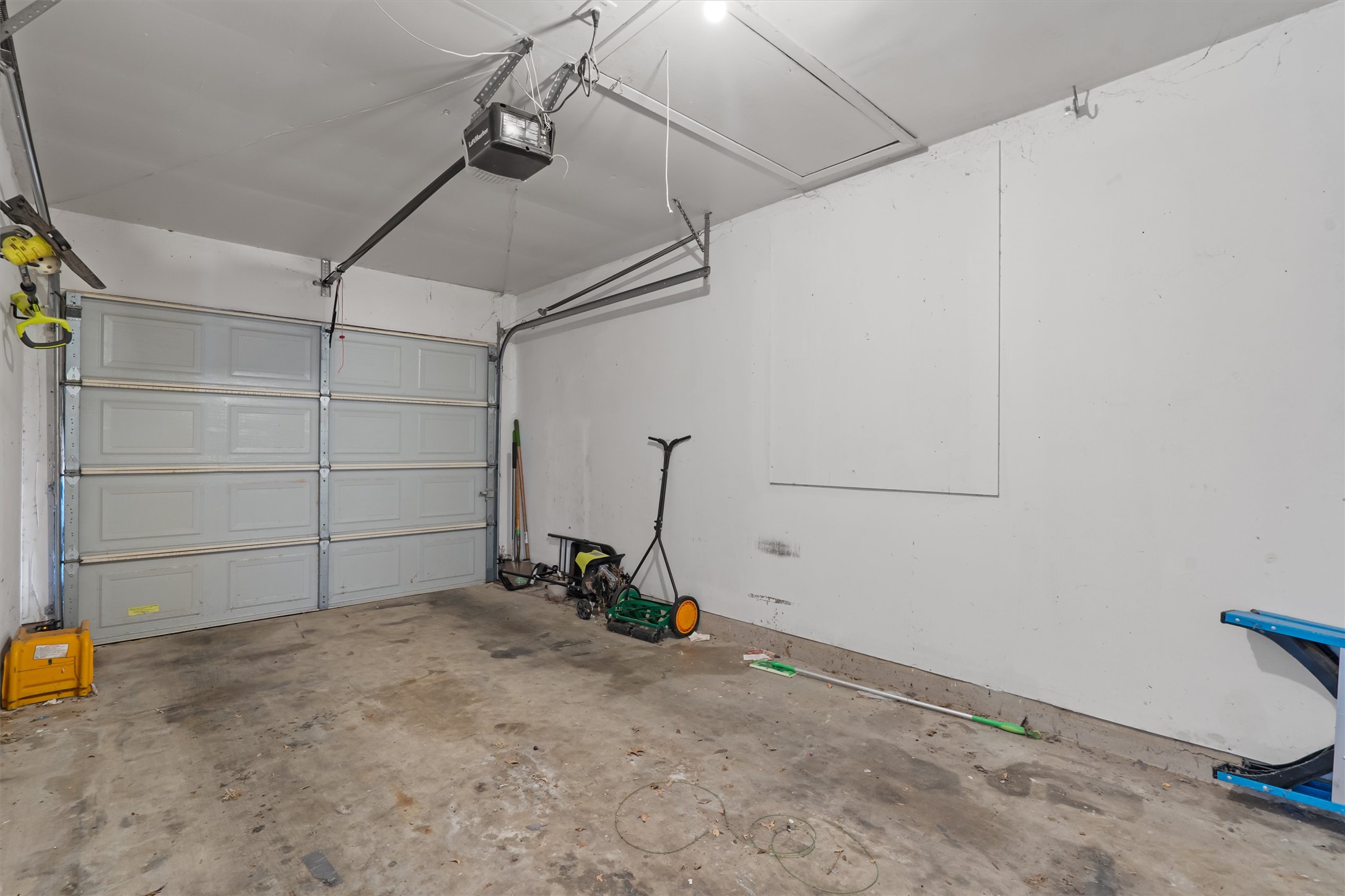 13357 Water Oak Lane, Unit A Austin, TX 78729 - Photo 18 of 26 a view of a garage room