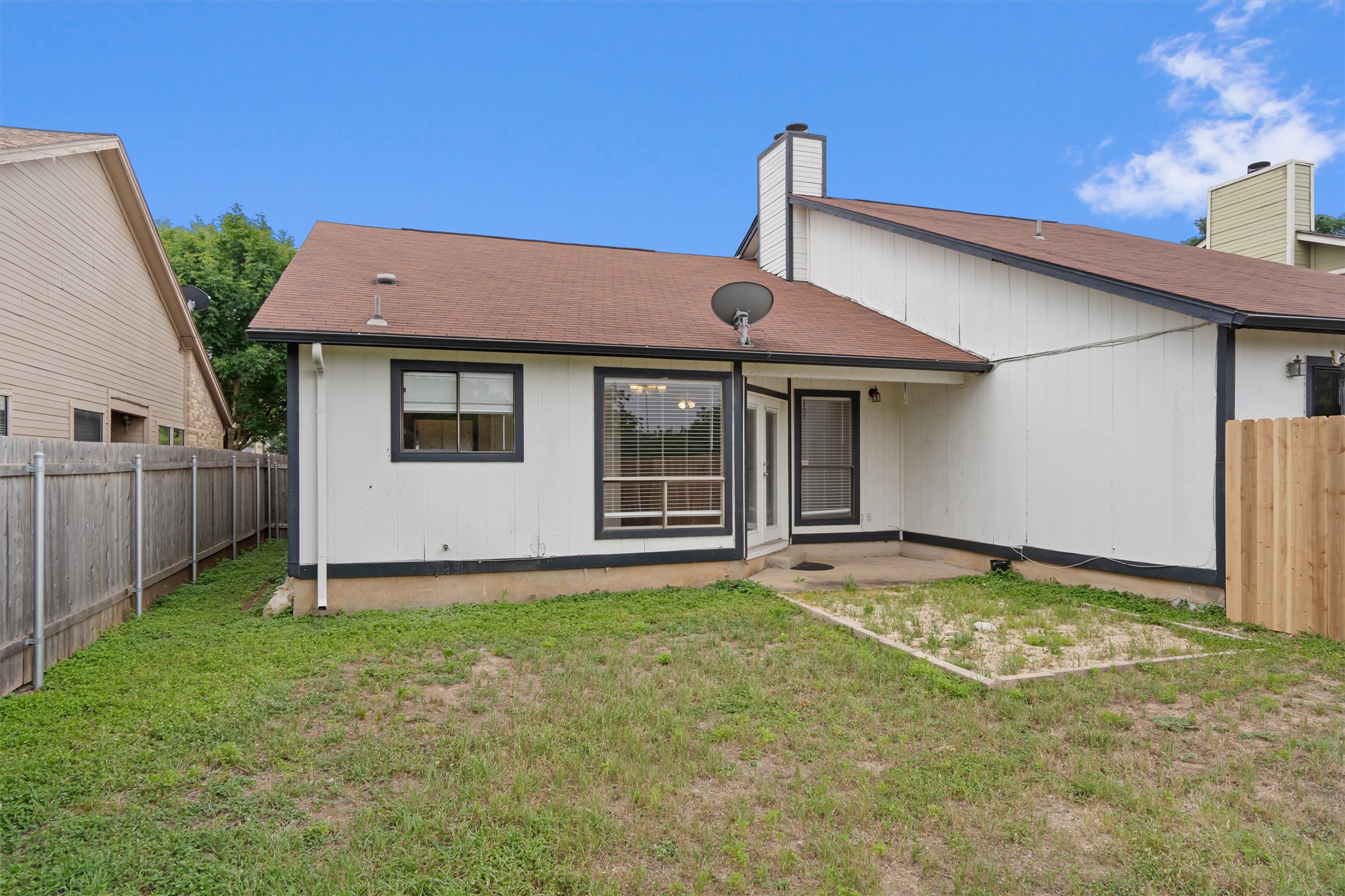 13357 Water Oak Lane, Unit A Austin, TX 78729 - Photo 22 of 26 a view of a house with backyard and porch