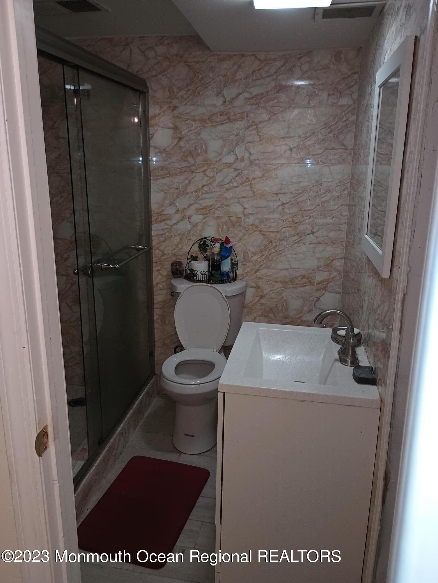 22 Clemson Road Parlin, NJ 08859 - Photo 13 of 20 a bathroom with a sink and toilet