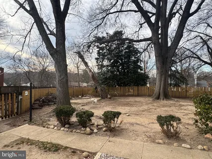 a view of a balcony with furniture