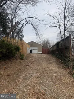 a view of a fountain in the yard
