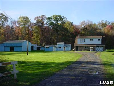 380 Swamp Road Wind Gap, PA 18091 - Photo 3 of 3 a front view of a house with a yard