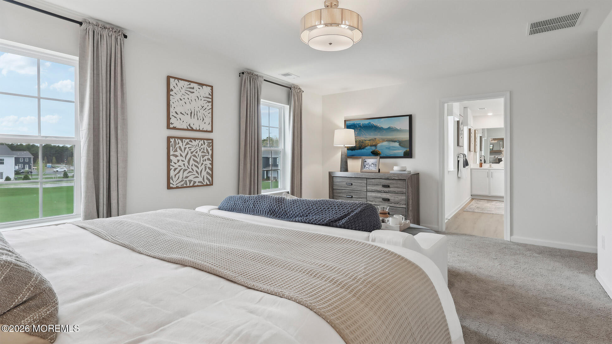 445 Ridge Avenue Hamilton, NJ 08610 - Photo 33 of 33 a bedroom with a bed and a chandelier