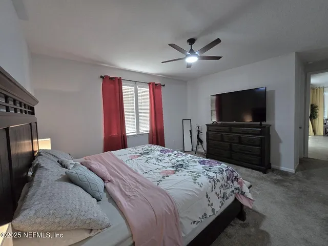 a bathroom with a granite countertop sink mirror bathtub and shower