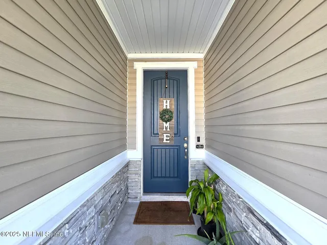 a view of front door and porch