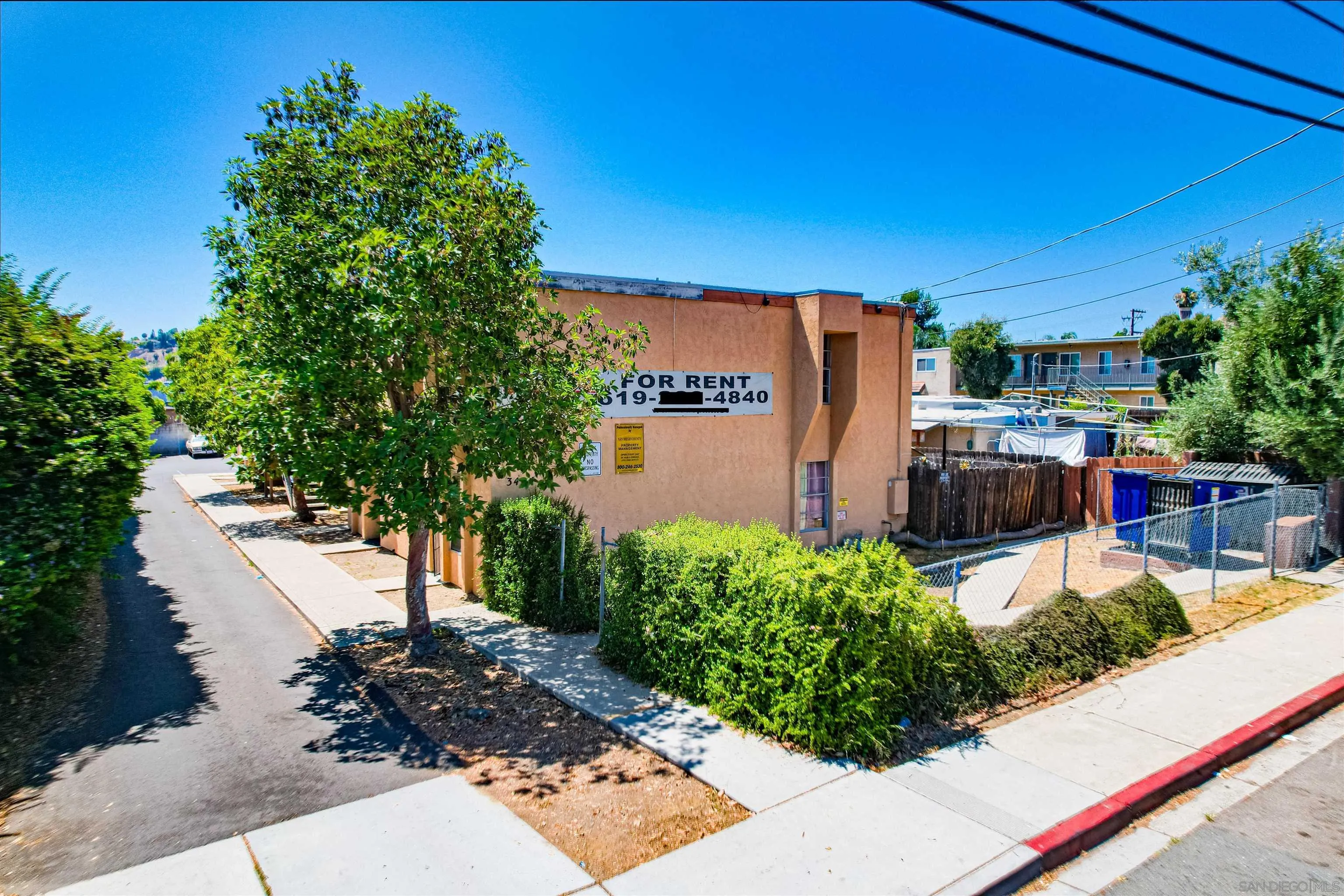 3404 Helix Street Spring Valley, CA 91977 - Photo 3 of 5 a backyard of a house with yard and outdoor seating