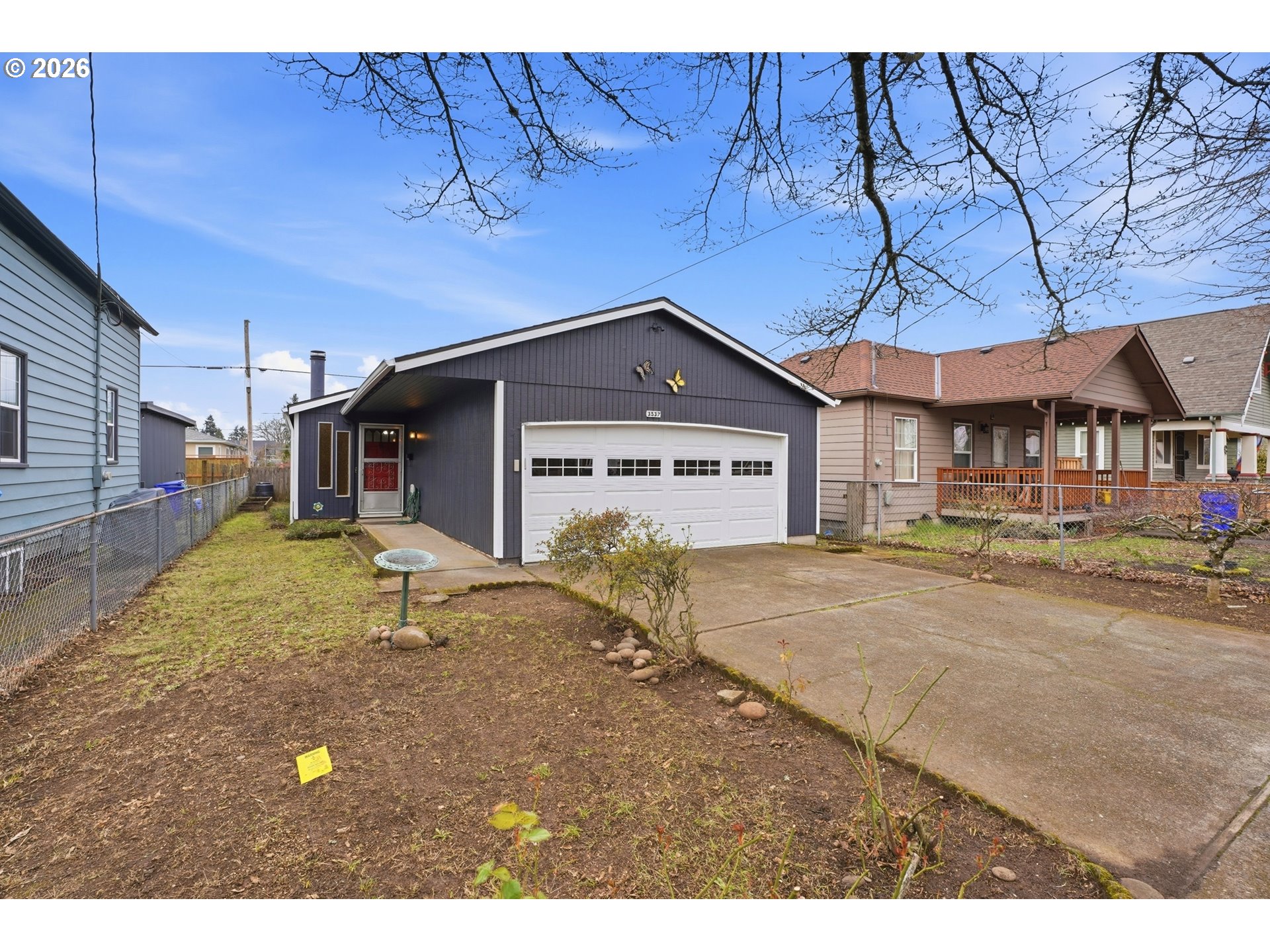a house view with a backyard space