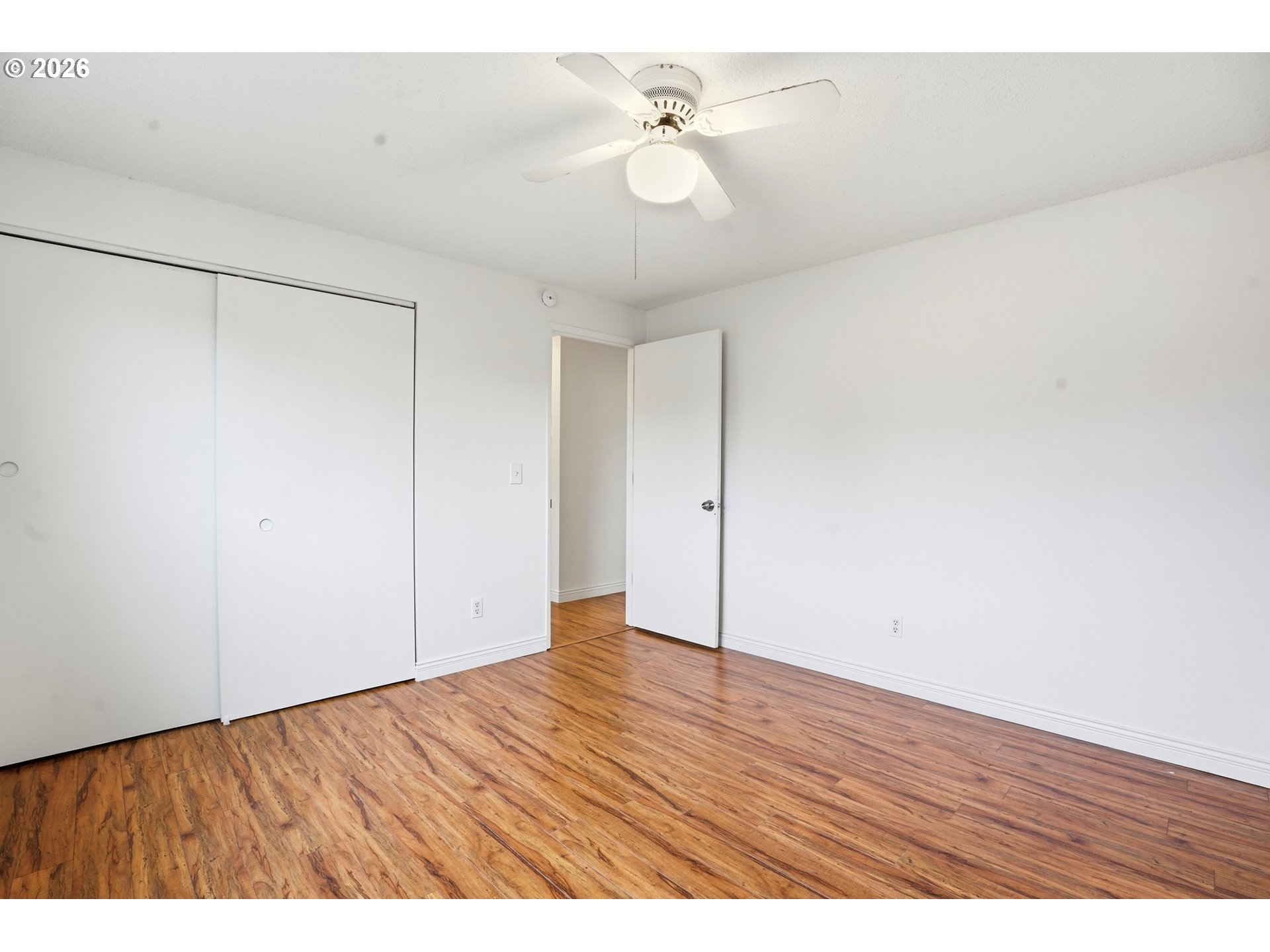 3537 Southeast 64th Avenue Portland, OR 97206 - Photo 14 of 32 a view of an empty room with a ceiling fan