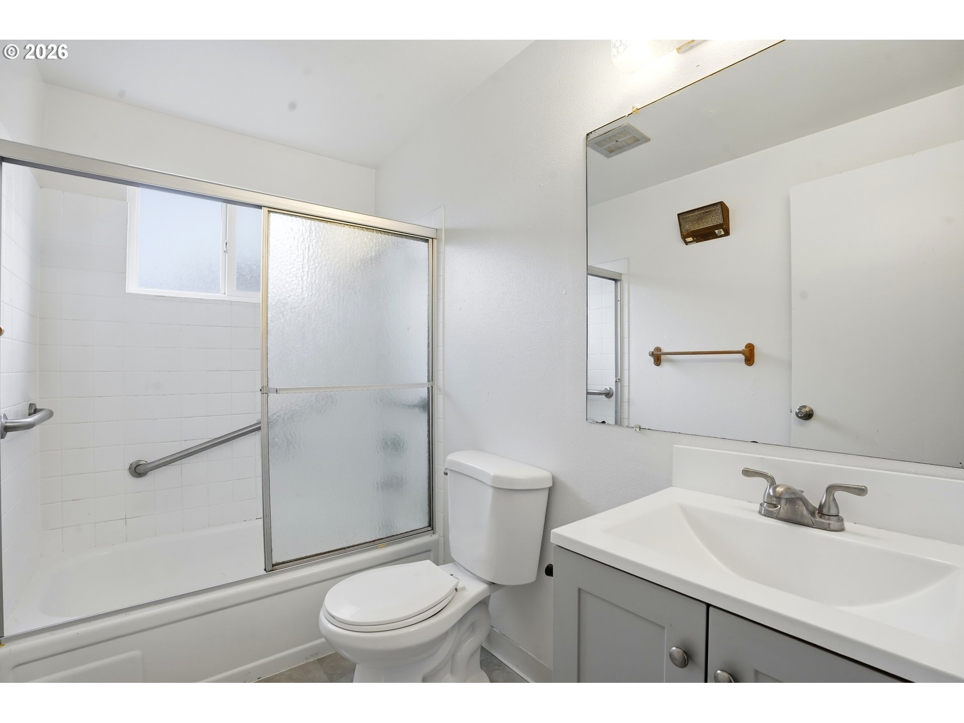 3537 Southeast 64th Avenue Portland, OR 97206 - Photo 17 of 32 a bathroom with a sink a toilet and shower