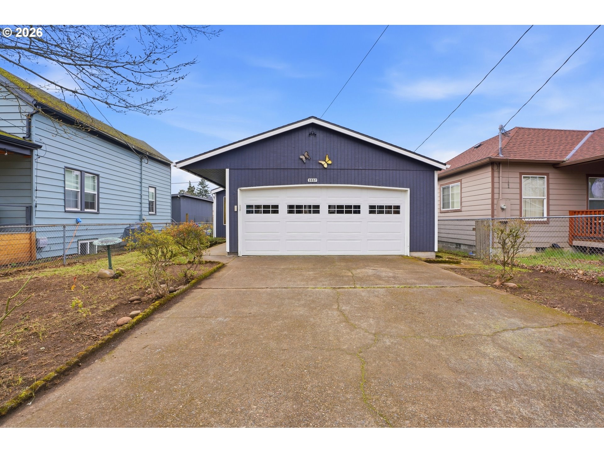 3537 Southeast 64th Avenue Portland, OR 97206 - Photo 2 of 32 a view of a house with a yard